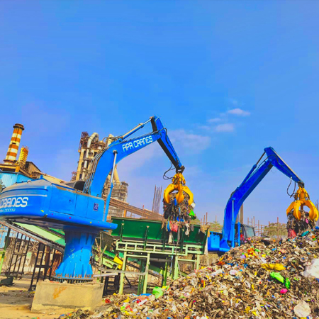 stationary electric material handler